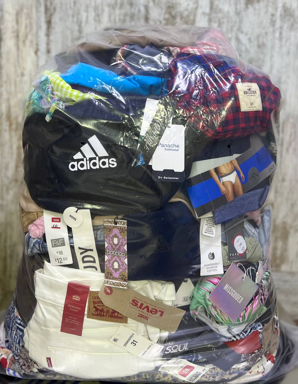 Premium stock clothing warehouse with organized inventory